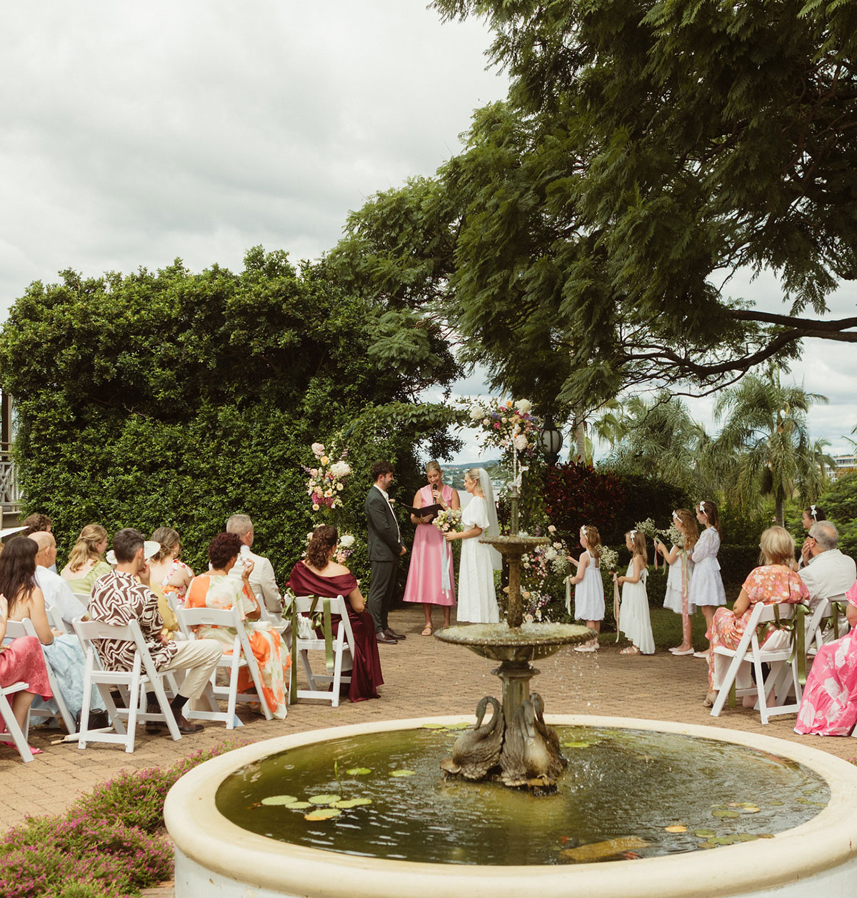 Wedding ceremony set in the Courtyard of Newstead House with a fountain in the foreground